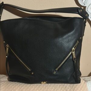 Michael Kors Black and Gold Shoulder Bag with Slouchy Design